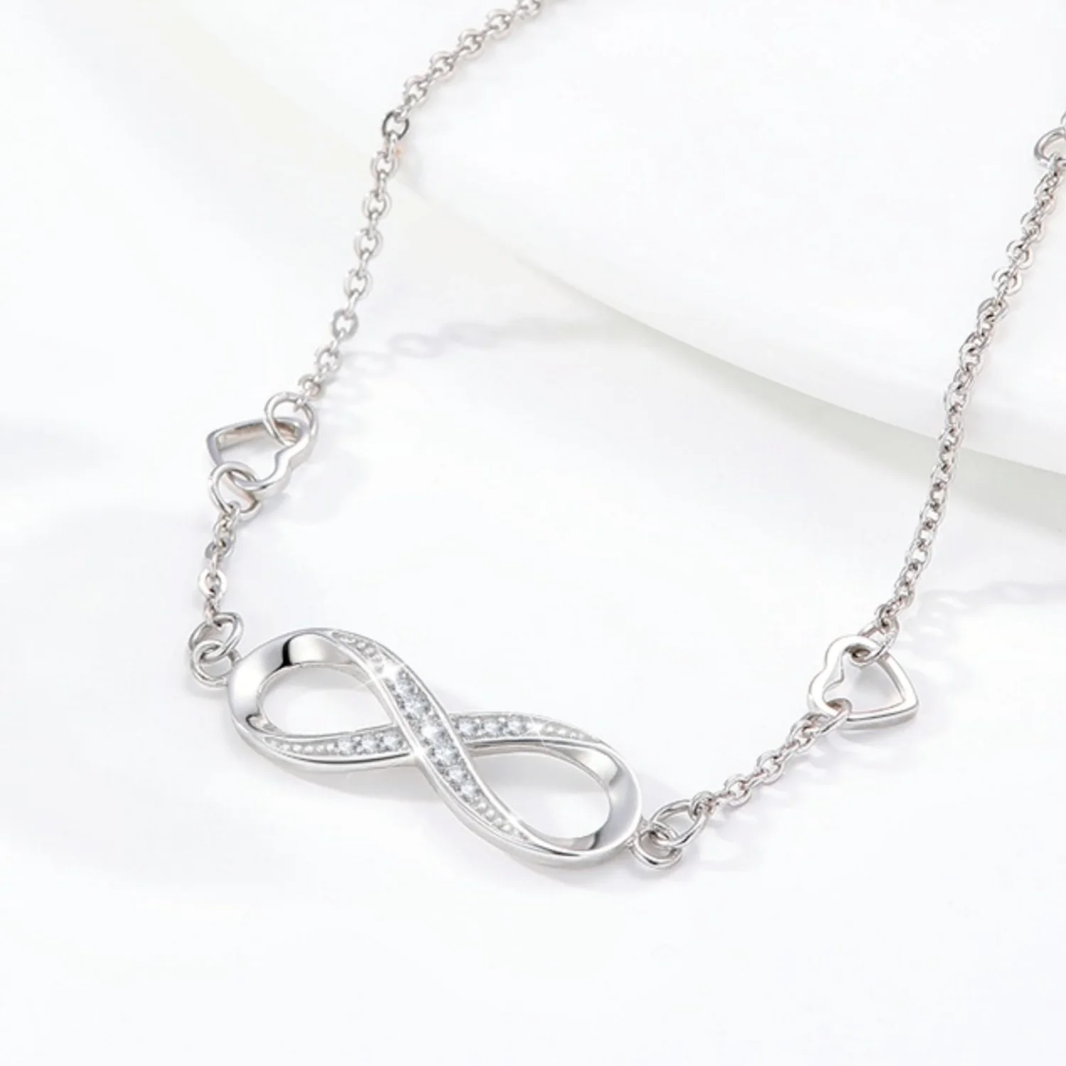 A close view of the infinity bracelet and its clasp